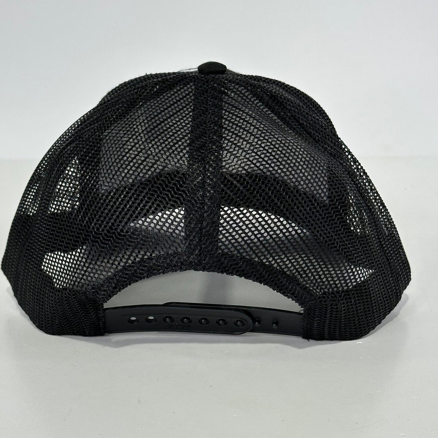 Devils Den Black Trucker